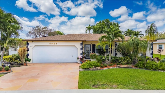22483 Labrador St, Boca Raton, FL 33428 - ranch-style house with stucco siding, an attached garage, a front lawn, and driveway