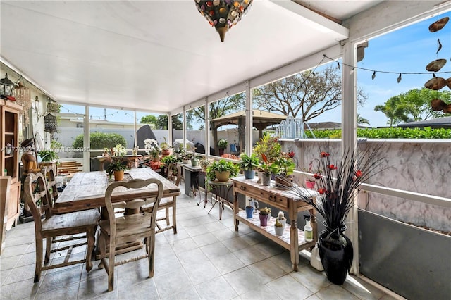 22483 Labrador St, Boca Raton, FL 33428 - sunroom featuring outdoor dining space and tile patterned floors
