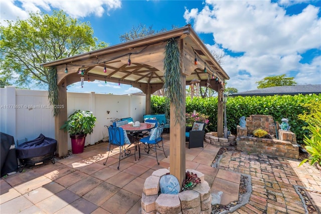 22483 Labrador St, Boca Raton, FL 33428 - fenced backyard featuring a gazebo, a patio, and outdoor dining area