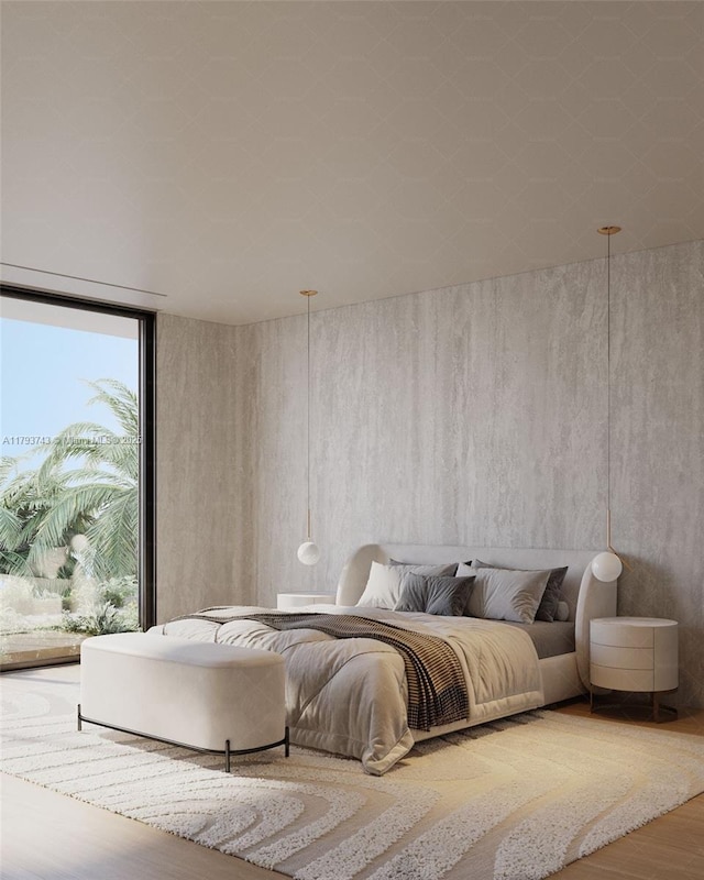 bedroom featuring access to outside, floor to ceiling windows, and wood finished floors