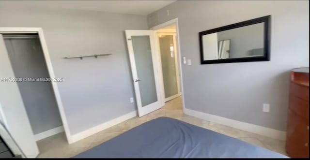 1881 Washington Ave Unit 8C, Miami Beach, FL 33139 - bedroom with baseboards