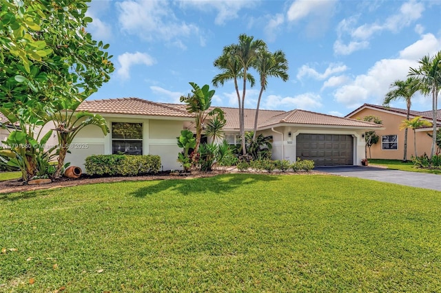 5133 N Springs Way, Coral Springs, FL 33076 - view of front of home featuring stucco siding, a tiled roof, and aphalt driveway