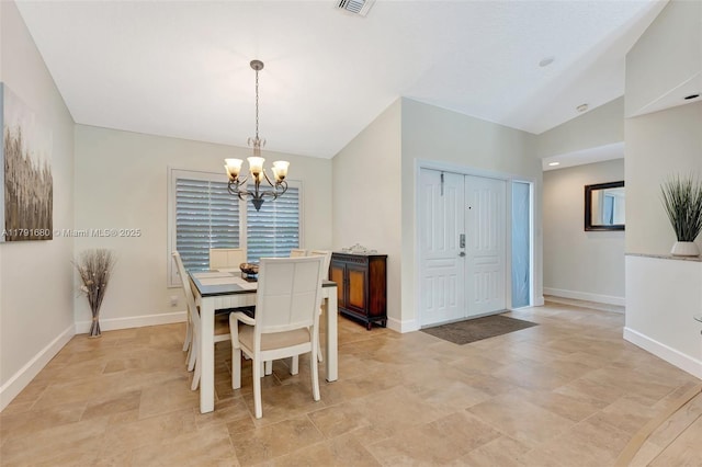 5133 N Springs Way, Coral Springs, FL 33076 - dining area featuring baseboards, stone finish flooring, lofted ceiling, and a chandelier