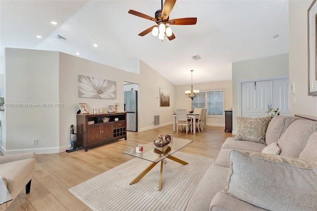 5133 N Springs Way, Coral Springs, FL 33076 - living room with ceiling fan with notable chandelier, vaulted ceiling, and visible vents