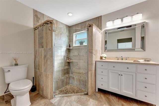 5133 N Springs Way, Coral Springs, FL 33076 - bathroom featuring vanity, a stall shower, and toilet