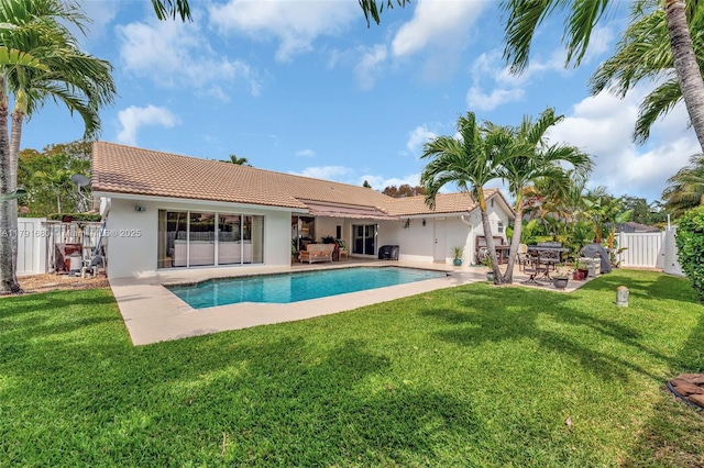5133 N Springs Way, Coral Springs, FL 33076 - back of property featuring a tiled roof, a fenced backyard, and stucco siding