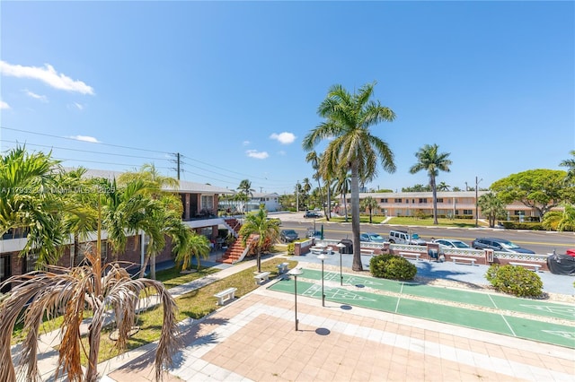 view of home's community with shuffleboard