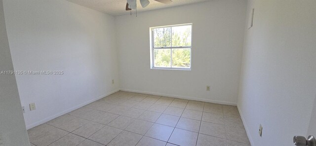 8240 SW 210th St Unit 214, Cutler Bay, FL 33189 - empty room featuring ceiling fan, light tile patterned floors, and baseboards