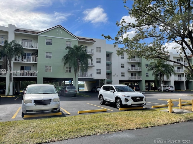 8240 SW 210th St Unit 214, Cutler Bay, FL 33189 - view of property with uncovered parking