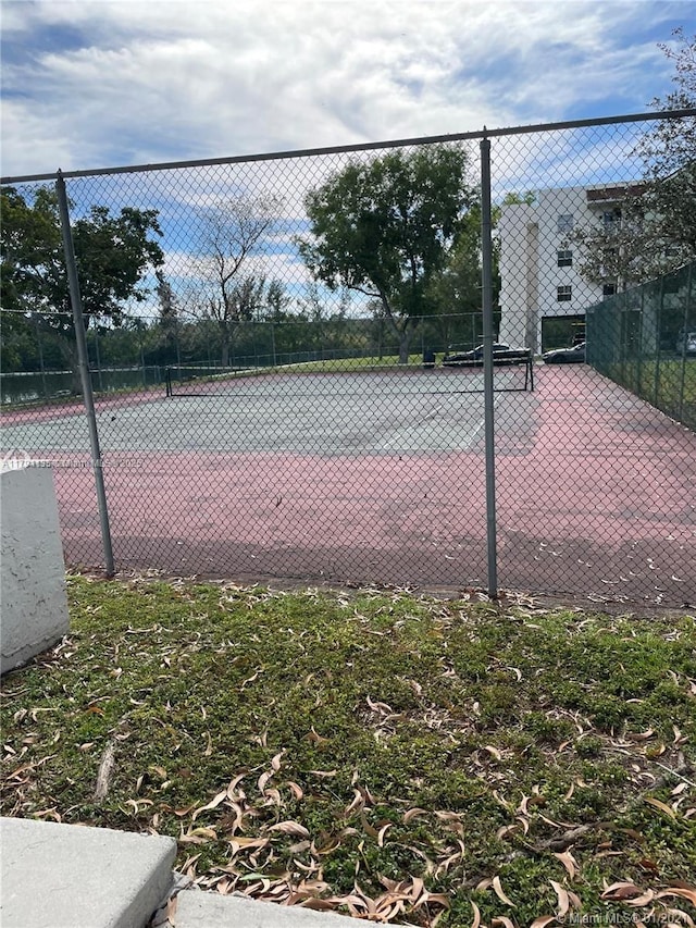 8240 SW 210th St Unit 214, Cutler Bay, FL 33189 - view of tennis court featuring fence