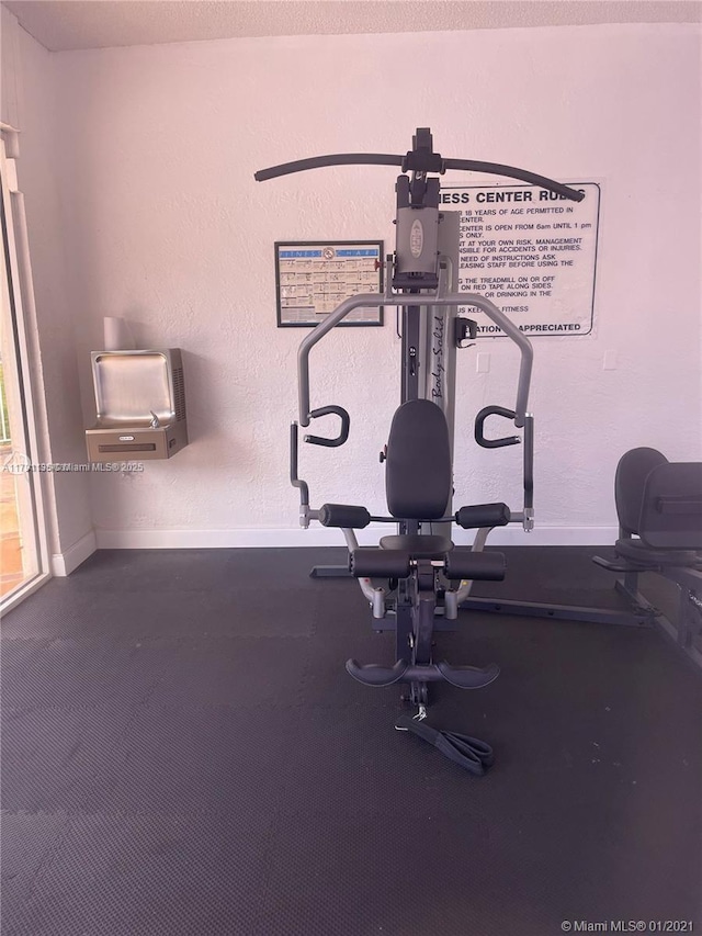 8240 SW 210th St Unit 214, Cutler Bay, FL 33189 - exercise room with baseboards