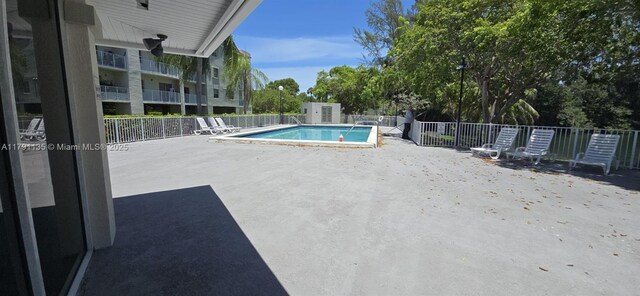 8240 SW 210th St Unit 214, Cutler Bay, FL 33189 - community pool with a patio area