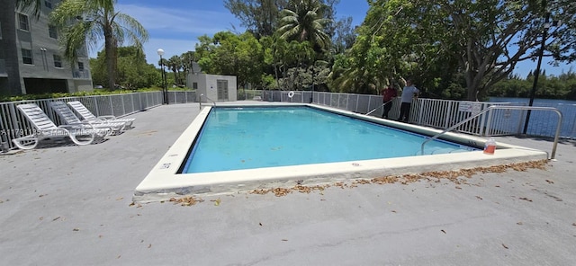 8240 SW 210th St Unit 214, Cutler Bay, FL 33189 - community pool featuring view of wooded area and a patio