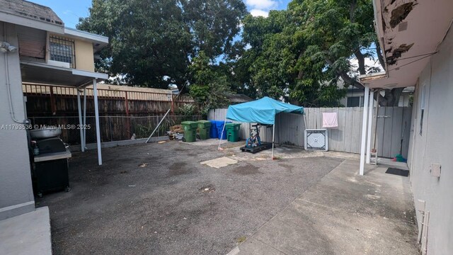 248 SW 18th Ct, Miami, FL 33135 - view of patio / terrace with fence and area for grilling