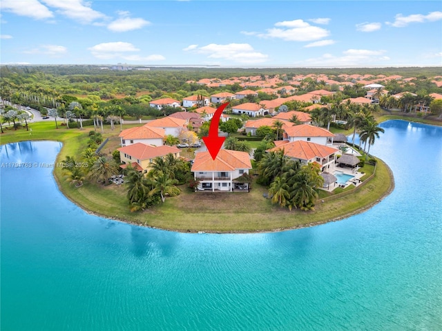 aerial view featuring a water view and a residential view