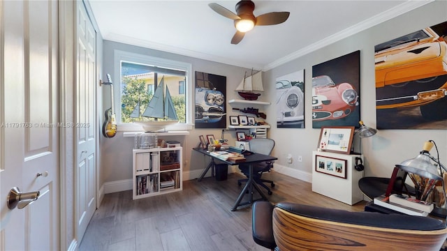 office with a ceiling fan, baseboards, ornamental molding, and wood finished floors
