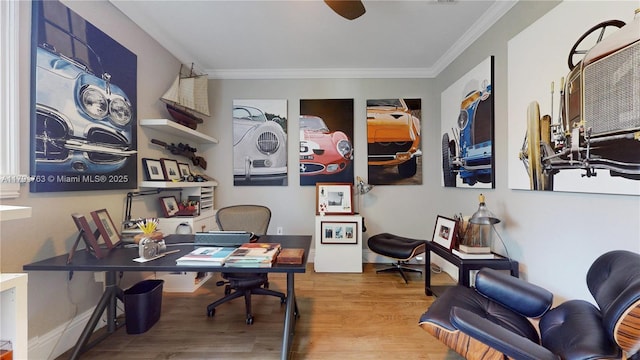 office space featuring ceiling fan, ornamental molding, and wood finished floors