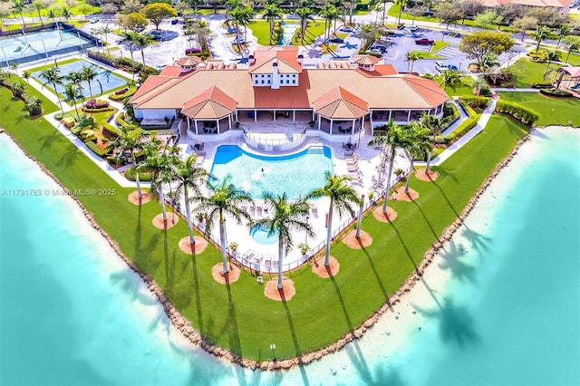 bird's eye view featuring a beach view and a water view