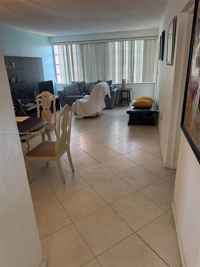 18555 NE 14th Ave Unit 602, Miami, FL 33179 - living area with light tile patterned floors