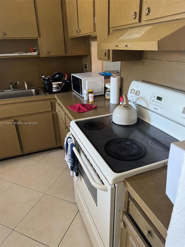 18555 NE 14th Ave Unit 602, Miami, FL 33179 - kitchen with a sink, light tile patterned floors, under cabinet range hood, and white appliances