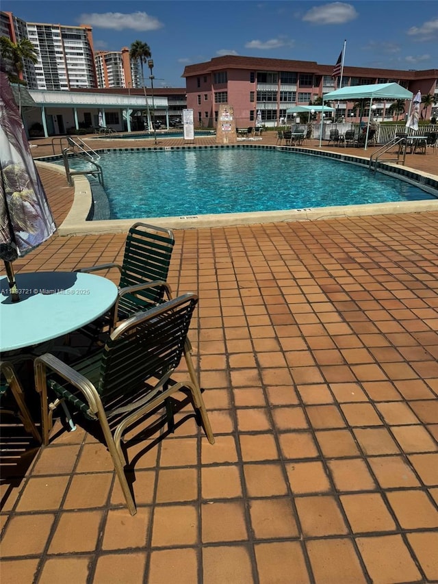 18555 NE 14th Ave Unit 602, Miami, FL 33179 - pool featuring a patio