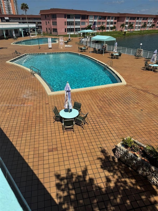 18555 NE 14th Ave Unit 602, Miami, FL 33179 - pool featuring fence and a patio area