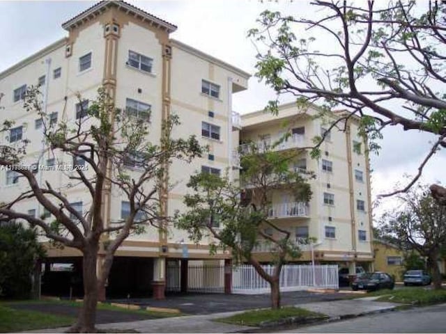 view of building exterior featuring fence