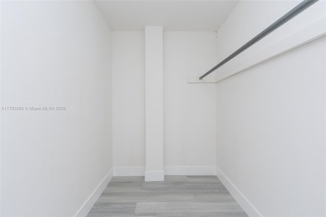 3600 NE 170th St Unit D-112, North Miami Beach, FL 33160 - spacious closet with light wood-style flooring