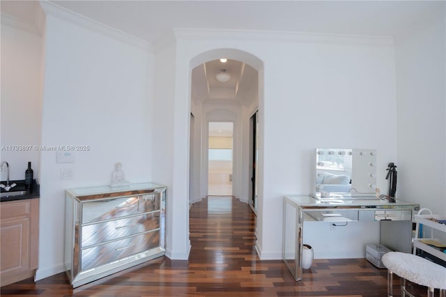 15852 SW 15th St, Davie, FL 33326 - hallway with crown molding, dark wood-style flooring, a sink, baseboards, and arched walkways