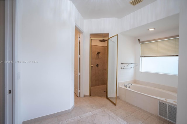 15852 SW 15th St, Davie, FL 33326 - full bathroom with tile patterned floors, visible vents, tiled shower, and a garden tub