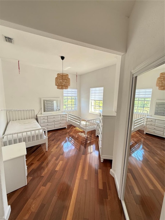 15852 SW 15th St, Davie, FL 33326 - living area featuring plenty of natural light, visible vents, and dark wood-type flooring