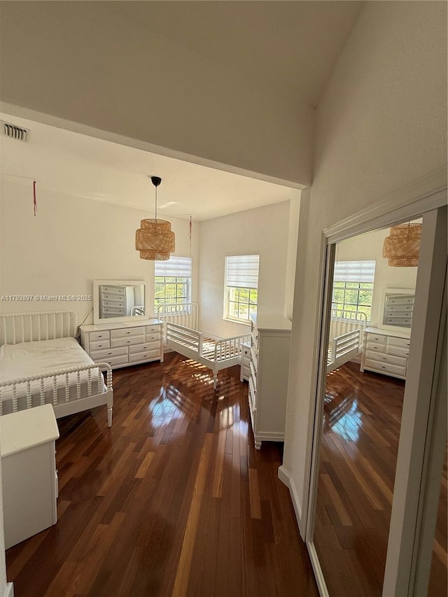 15852 SW 15th St, Davie, FL 33326 - living room featuring a healthy amount of sunlight, dark wood-style flooring, and visible vents