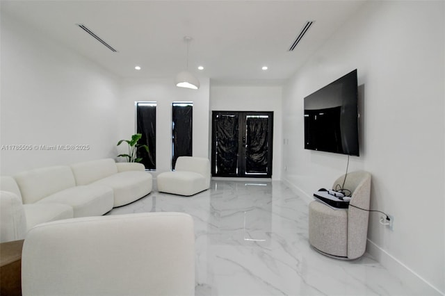 living room with visible vents, recessed lighting, marble finish floor, and baseboards