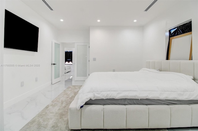 bedroom featuring baseboards, recessed lighting, and marble finish floor