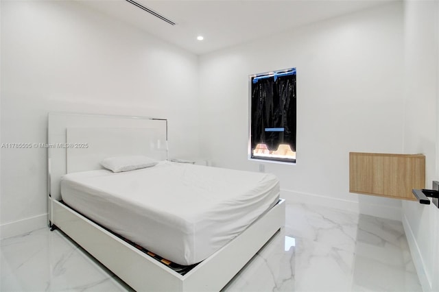 bedroom featuring recessed lighting, baseboards, and marble finish floor