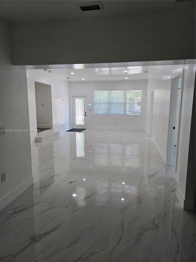 987 NE 145th St, North Miami, FL 33161 - unfurnished room with baseboards and light marble finish flooring