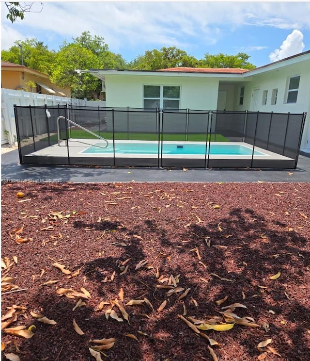 987 NE 145th St, North Miami, FL 33161 - view of swimming pool with a fenced backyard and a patio area