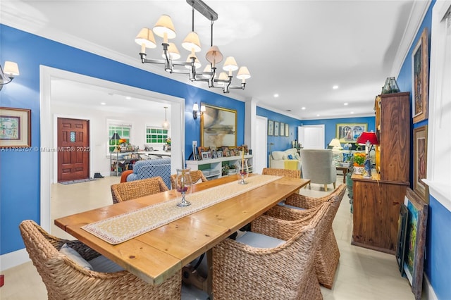 dining area featuring crown molding, recessed lighting, and a notable chandelier