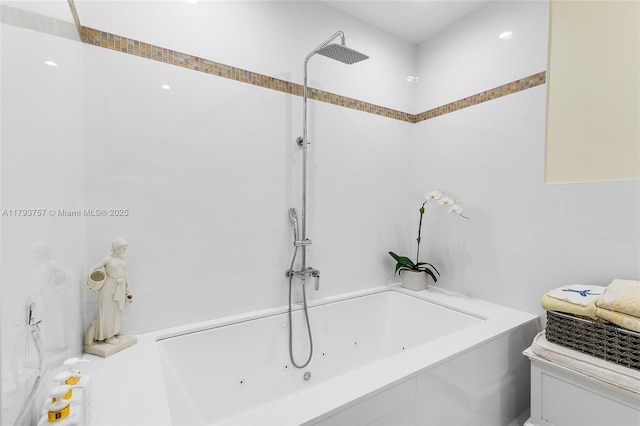 full bath featuring a whirlpool tub, tile walls, and a shower
