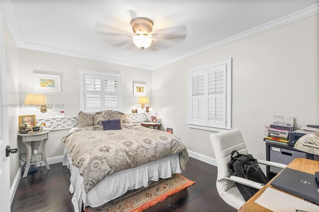 bedroom featuring crown molding, baseboards, a ceiling fan, and dark wood-type flooring