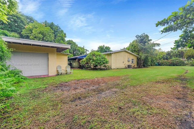 13101 SW 82nd Ave, Pinecrest, FL 33156 - view of grassy yard featuring cooling unit