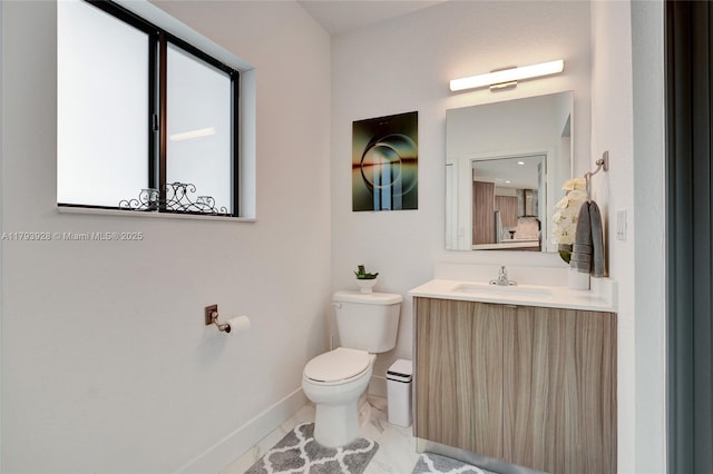 14631 SW 20th St, Miami, FL 33175 - half bath featuring toilet, baseboards, and vanity