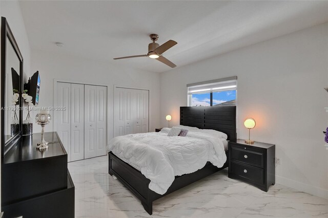 14631 SW 20th St, Miami, FL 33175 - bedroom with two closets, a ceiling fan, baseboards, and marble finish floor