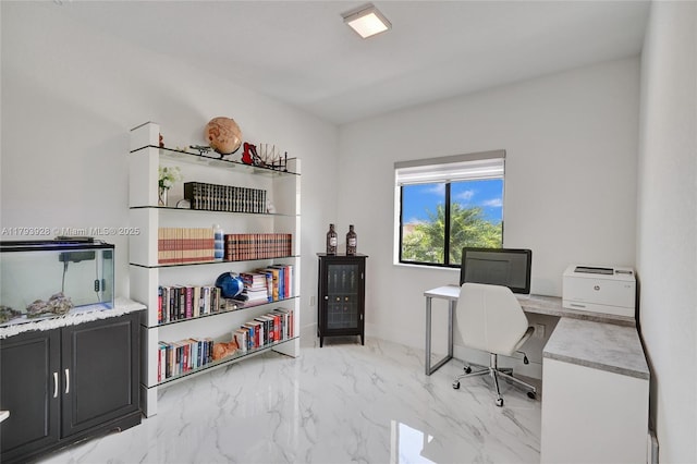 office area featuring marble finish floor