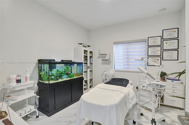 office area featuring marble finish floor