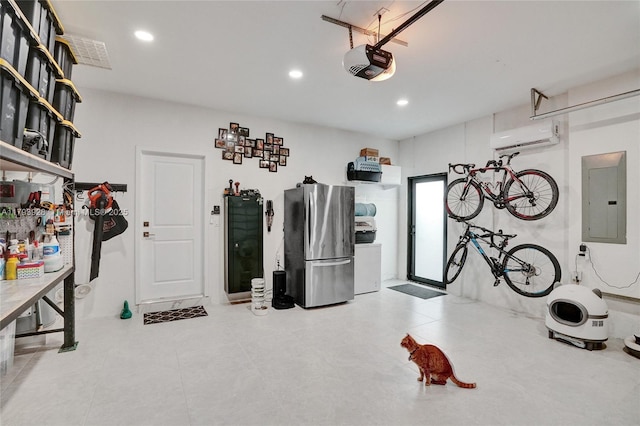 garage with electric panel, a wall mounted air conditioner, freestanding refrigerator, a garage door opener, and recessed lighting