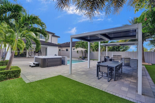 view of patio featuring area for grilling, a hot tub, and a fenced backyard
