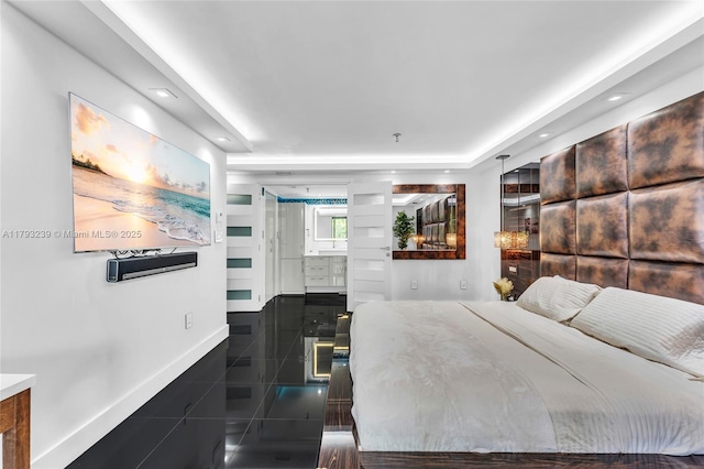 bedroom featuring baseboards, recessed lighting, and granite finish floor