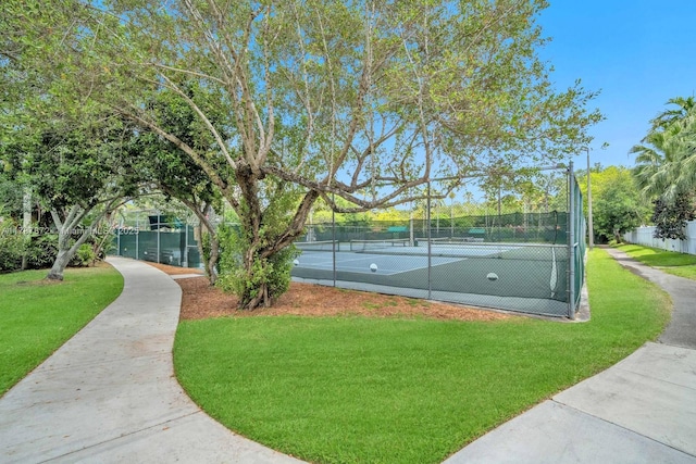 2724 Cayenne Ave, Cooper City, FL 33026 - view of property's community with a yard, a tennis court, and fence