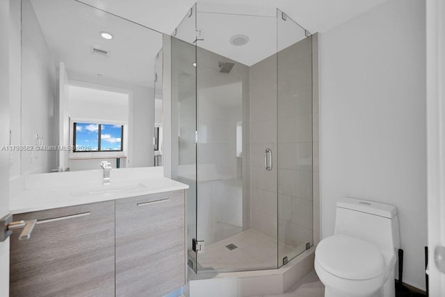 650 NE 32nd St Unit 1004, Miami, FL 33137 - bathroom with visible vents, toilet, and a shower stall